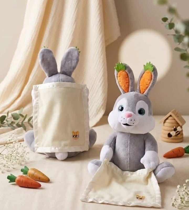 Plush stuffed bunny rabbit with attached blanket