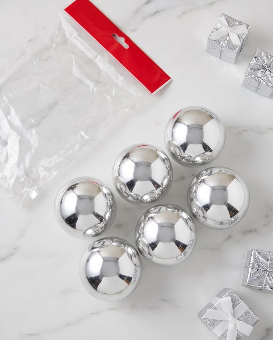 shiny, silver-mirrored balls.