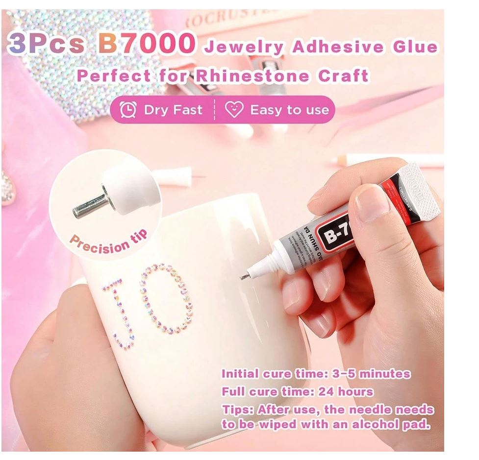 A multicolored resin flatback rhinestone bedazzling kit with tools.