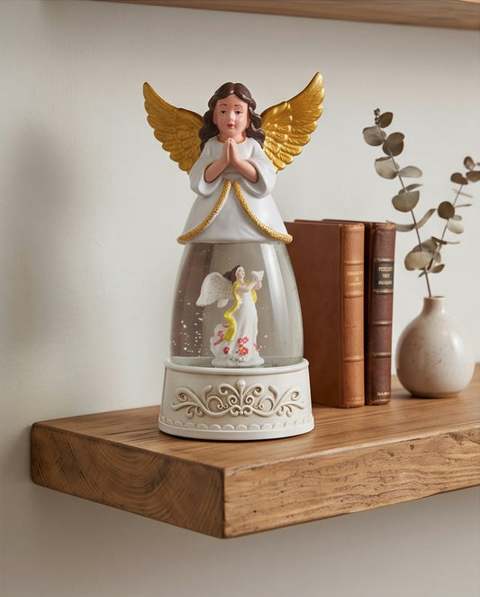 illuminated Christmas angel snow globe